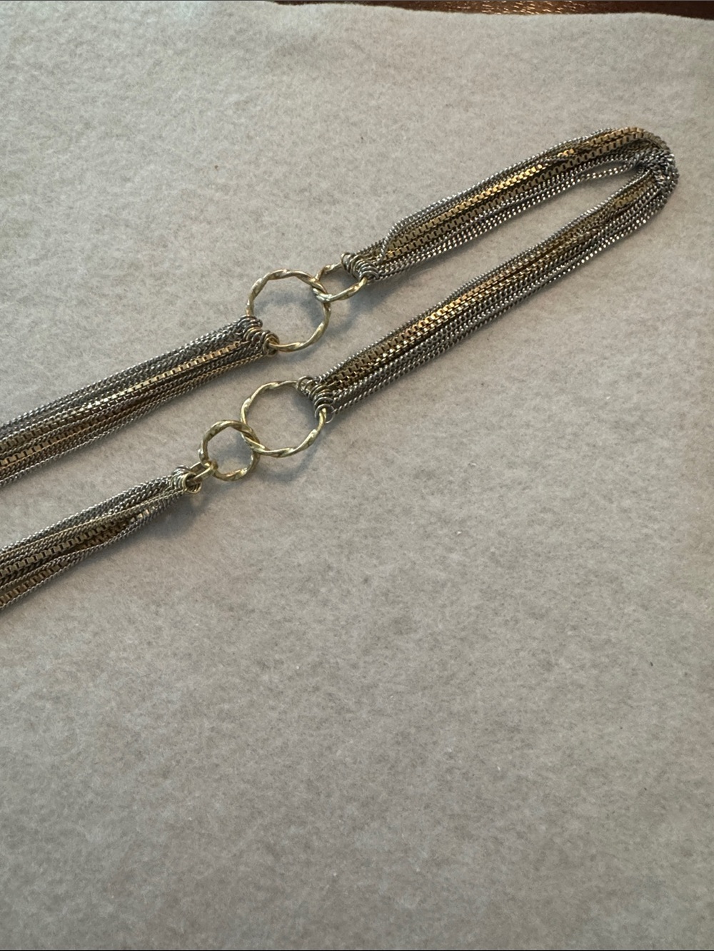 Lia Sophia Silver and Gold Multi-Chain Metallic Necklace with Rings